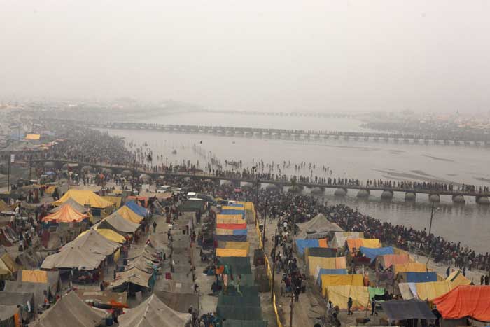 Magh Mela: Devotees take holy dip at Sangam in Allahabad | Picture ...