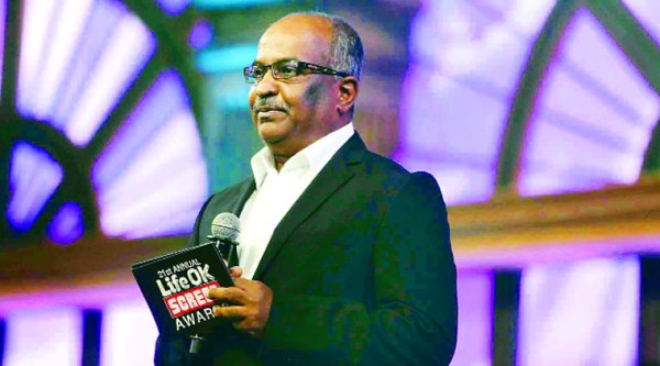 George Varghese addresses the audience at the Awards night