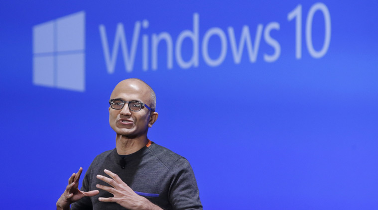 Microsoft CEO Satya Nadella speaks at an event demonstrating the new features of Windows 10 at the company's headquarters Wednesday, Jan. 21, 2015, in Redmond, Wash. Executives demonstrated how they said the new Windows is designed to provide a more consistent experience and a common platform for software apps on different devices, from personal computers to tablets, smartphones and even the company's Xbox gaming console. (AP Photo/Elaine Thompson)