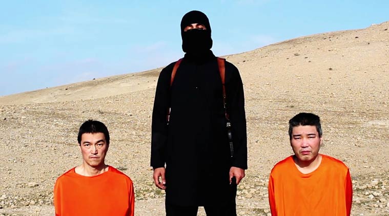 This image taken from an online video released by the Islamic State group's al-Furqan media arm on Tuesday, Jan. 20, 2015, purports to show the group threatening to kill two Japanese hostages that the militants identify as Kenji Goto, left, and Haruna Yukawa, right, unless a $200 million ransom is paid within 72 hours. (Source: AP)