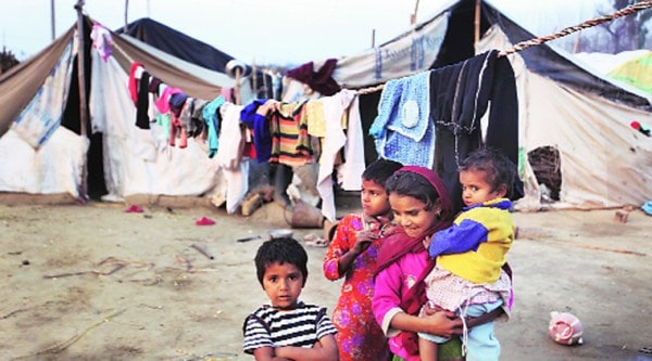 Gulafza (red scarf) with her surviving siblings, who hail from Baghpat, in the camp at Kairana in Shamli district.  (Source: IE photo by Oinam Anand)
