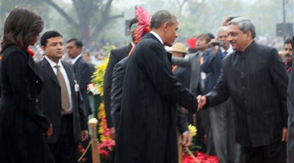 US President Barack Obama shakes hands with Defence Minister Manohar Parrikar during the 66th Republic Day Celebration at Rajpath in New Delhi on Monday. (PTI Photo)