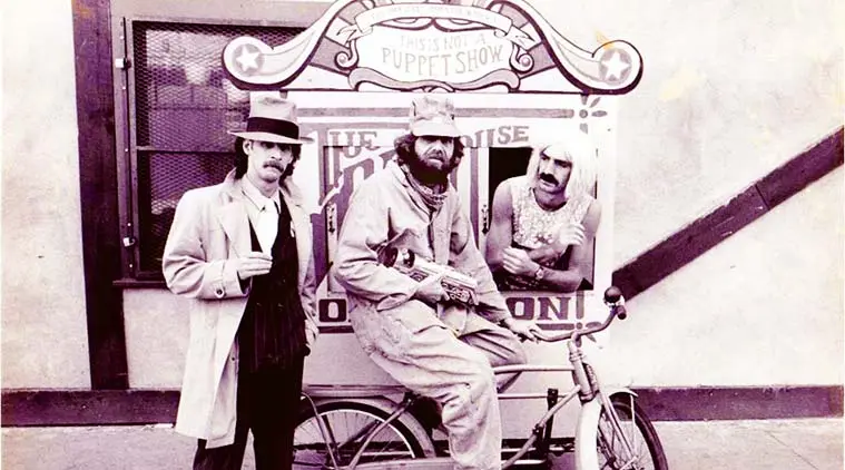 Marcel Steiner (right) with an early model of The Smallest Theatre in the World, attached to a bicycle. (Source: Lemmings Theatre )
