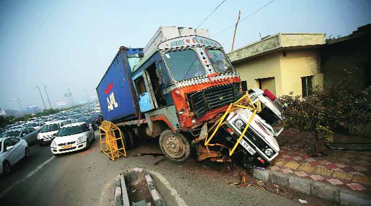 Motorists pass by the accident spot in Mayur Vihar on Tuesday morning. (Source: Express photo by Praveen Khanna)