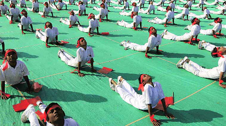 yoga, yoga day, international yoga day, world yoga day,  Sangh Parivar,  RSS, yoga muslims, muslims yoga , indian express column, ie column, Dilip Simeon column