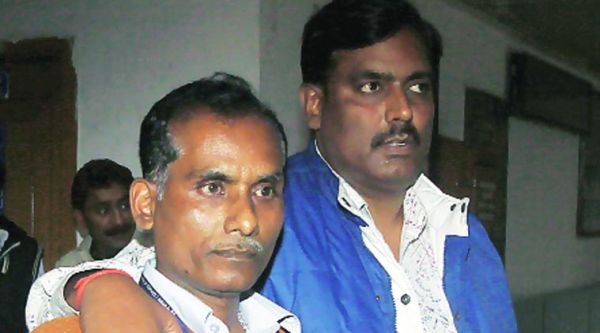 The accused in police custody on Monday.   (Prem Nath Pandey)