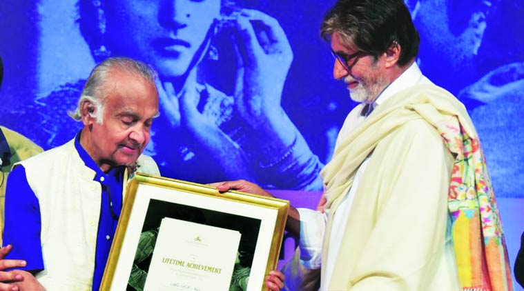Amitabh Bachchan presents the Lifetime Achievement award to PK Nair.