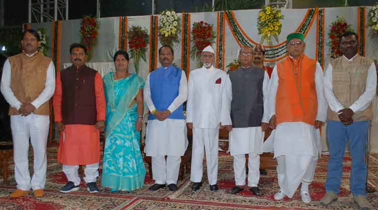 Jharkhand governor Syed Ahmed (L-5th) along with Jharkhand Chief Minister Raghubar Das (L-4th) and newly six ministers after taking oath ceremony at Birsa Mandap in Raj Bhawan, Ranchi on Thursday. (Source: Manob Chowdhury)