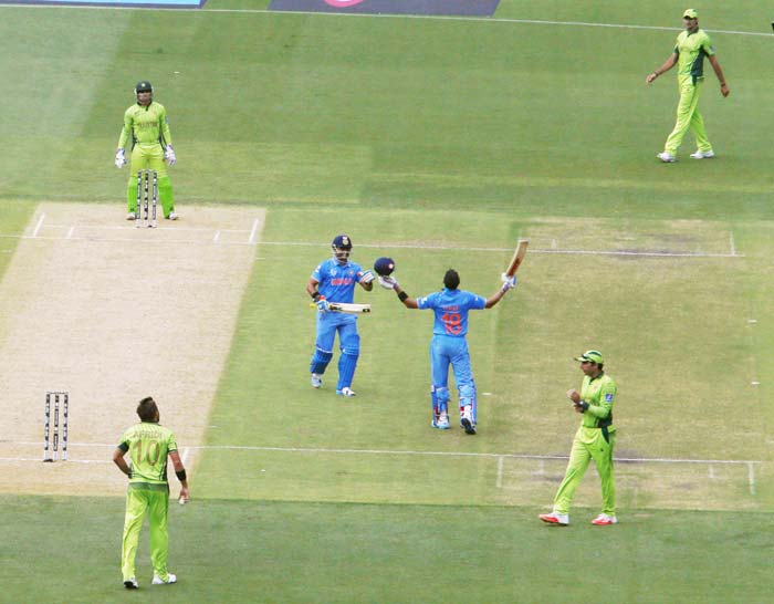 india pakistan, india pakistan match photo, india vs pakistan, india pakistan match, india pakistan match photos, match pictures ind pak, india pakistan world cup, india pakistan world cup gallery, india pakistan gallery, cricket news, cricket