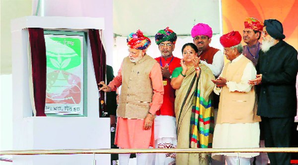 Prime Minister Narendra Modi with Rajasthan CM Vasundhara Raje at the launch of the scheme. (PTI)