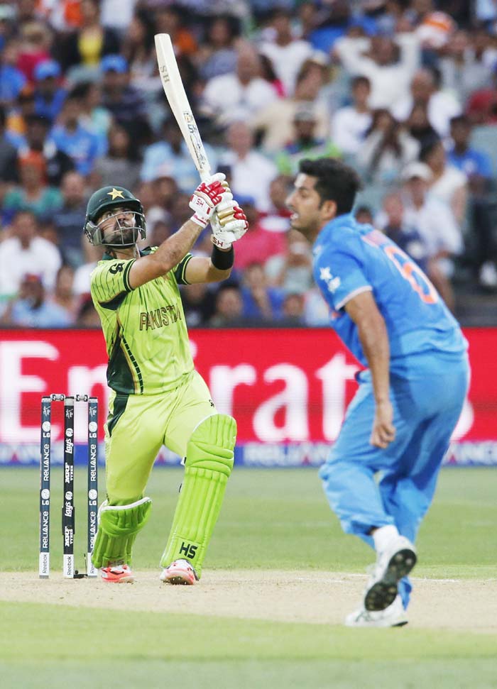 india pakistan, india pakistan match photo, india vs pakistan, india pakistan match, india pakistan match photos, match pictures ind pak, india pakistan world cup, india pakistan world cup gallery, india pakistan gallery, cricket news, cricket
