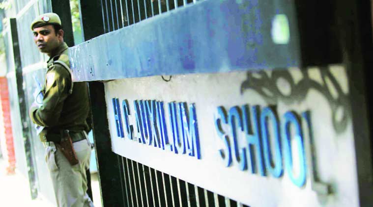 A policeman stands guard outside Holy Child Auxilium School on Friday. (Source:Express photo by Tashi Tobgyal)