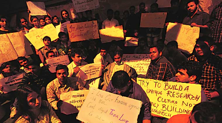 Members of the Research Scholars’ Association protest at Jantar Mantar. (Source: Express Photo by Tashi Tobgyal)