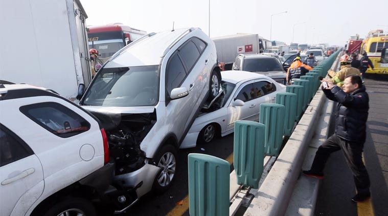 South korea, south korea car pile up, car accident, cars smash on bridge, Incheon International Airport, korean airport bridge jam, car pile up, World Newsvehicles sit on Yeongjong Bridge in Incheon, South Korea, Wednesday, Feb. 11, 2015.