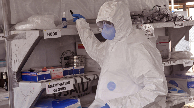 A health care worker inside a USAID, funded Ebola clinic in Monrovia, Liberia, Friday, Jan. 30, 2015. (AP Photo)