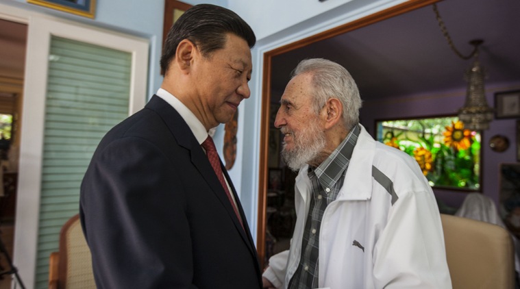 FILE - In this July 22, 2014 file photo, Cuba's Fidel Castro, right, greets China's President Xi Jinping in Havana, Cuba. in Havana, Cuba. (AP Photo)