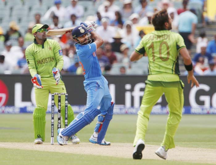 india pakistan, india pakistan match photo, india vs pakistan, india pakistan match, india pakistan match photos, match pictures ind pak, india pakistan world cup, india pakistan world cup gallery, india pakistan gallery, cricket news, cricket