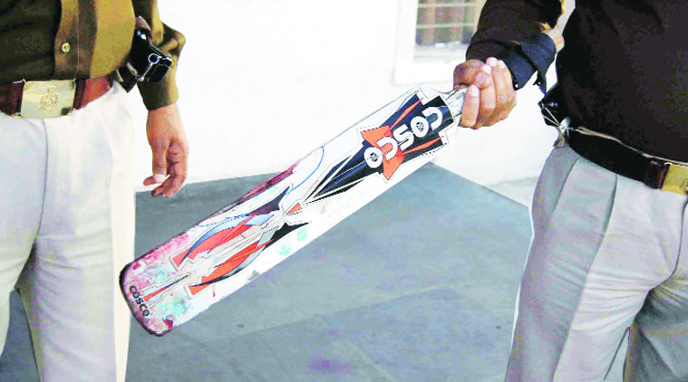 Cricket bat recovered from the couple’s flat in Gaur Village, Ghaziabad. photos: (Source: Express photo by Gajendra Yadav)