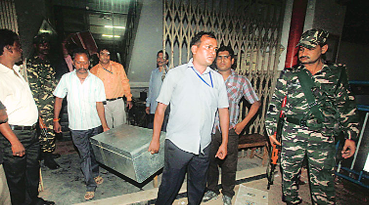 A trunk containing documents in connection to the Burdwan blast case being taken out of special NIA court in Kolkata on Monday. (Source: Express photo by Partha Paul)