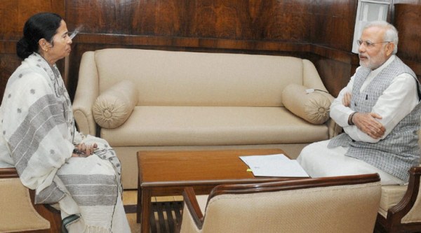 Prime Minister Narendra Modi with West Bengal Chief Minister Mamata Banerjee during a meeting in New Delhi on Monday. (Source: PTI)