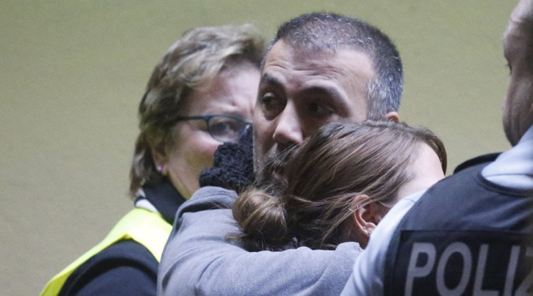 People waiting for flight 4U 9525 are led away by airport staff at the airport in Duesseldorf, Germany, Tuesday, March 24, 2015, after a Germanwings passenger jet carrying more than 140 people crashed in the French Alps region as it traveled from Barcelona to Duesseldorf. (AP Photo/Frank Augstein)