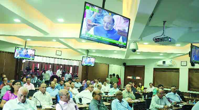 Members of the Gujarat Chamber of Commerce and Industries watch Arun Jaitley presenting the Budget, at GCCI office in Ahmedabad Saturday. (Source: Javed Raja)