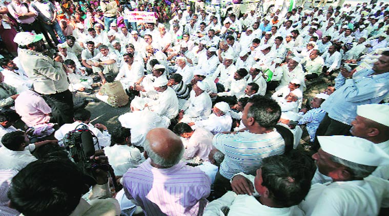 Raju Shetti with agitating farmers from Khed after the culmination of their march to Pune on Tuesday.(Express photo by Arul Horizon)