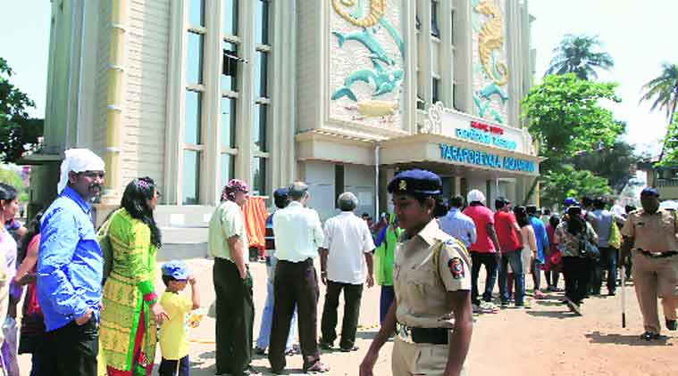 Visitors queue up to enter the recently re-opened Taraporewala Aquarium in Marine Drive on Sunday. (Source: Express photo by Ganesh Shirsekar)