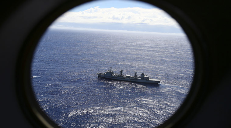 FILE - In this March 31, 2014 file photo, HMAS Success is viewed from a Royal New Zealand Air Force P3 Orion while both search for the missing Malaysia Airlines Flight 370 in the southern Indian Ocean, near the coast of Western Australia. (AP Photo/Rob Griffith, File)