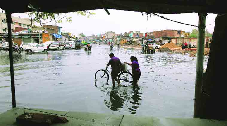 A waterlogged area in Ahmedabad on Sunday. (Source: Express photo by Javed Raja)