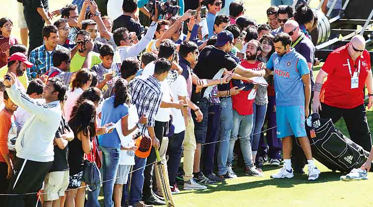 Rohit Sharma obliges a posse of fans after practice at the Eden Park in Auckland on Friday. (Source: Solaris Images)