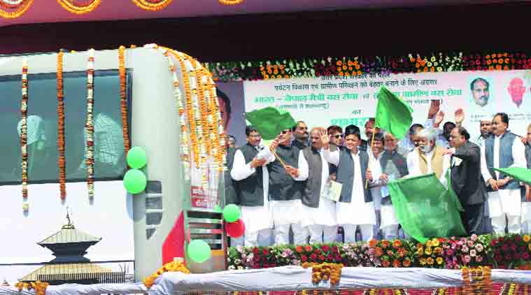Chief Minister Akhilesh Yadav inaugurates the Indo-Nepal Maitri Bus Service on Wednesday. (Source: Express photo by Anand Singh)