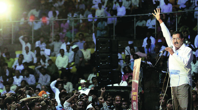 Arvind Kejriwal at the launch of the helpline at Talkatora Stadium on Sunday. (Source: Express photo by Ravi Kanojia)