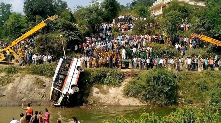 mumbai, bus falls into ditch, bus accident, bus accident in mumbai, palghar, police, indian express news