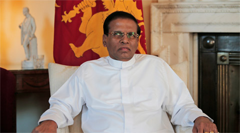 India's Prime Minister Narendra Modi shakes hands with Sri Lanka's  President Maithripala Sirisena during his welcome ceremony at the  Presidential Secretariat in Colombo