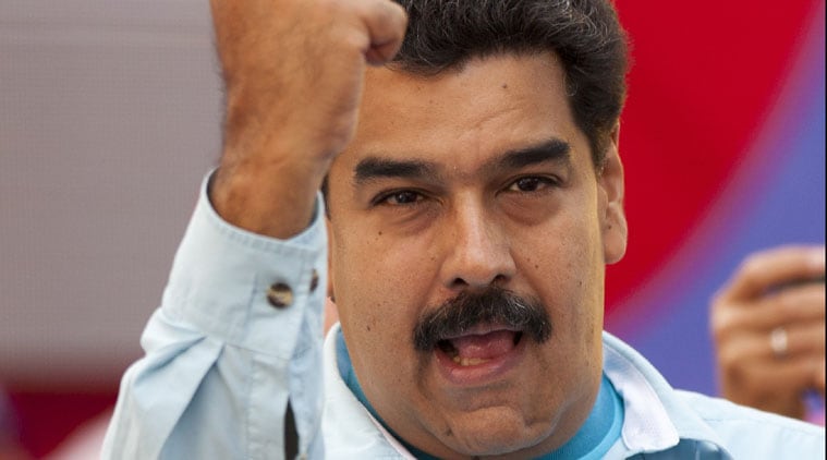 Venezuela's President Nicolas Maduro gestures to supporters during an anti-imperialist rally at Miraflores presidential palace in Caracas, Venezuela, Wednesday, March 18, 2015. (AP Photo)