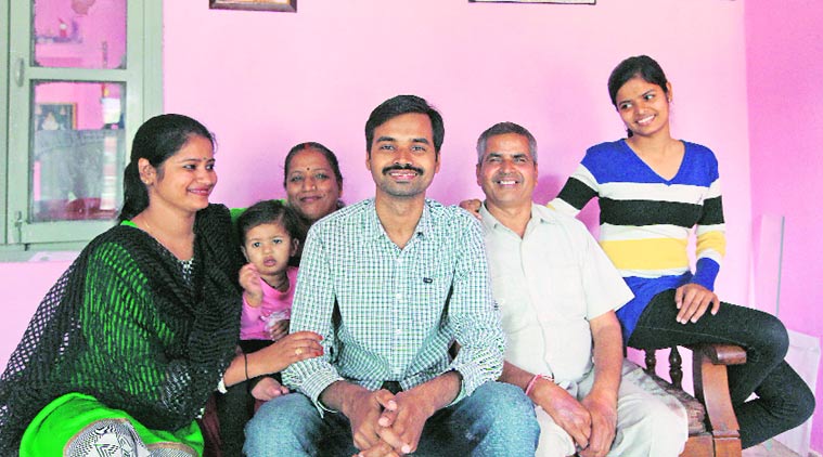 Ram Narayan Shukla with his family at their house in Chandigarh Saturday. (SourceL: Express photo by Kamleshwar Singh)