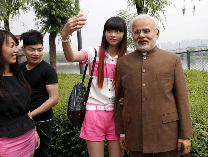Narendra Modi, Prime Minister Narendra Modi, Rahul Gandhi, Nepal Earthquake, Karachi Terror Attack, Rekha, Chinese Premier Li Keqiang, President Pierre Nkurunziza, Terracotta Warriors Museum, Nepal Earthquake, Karachi Terror Attack, Gunmen Killed Shiites, India News