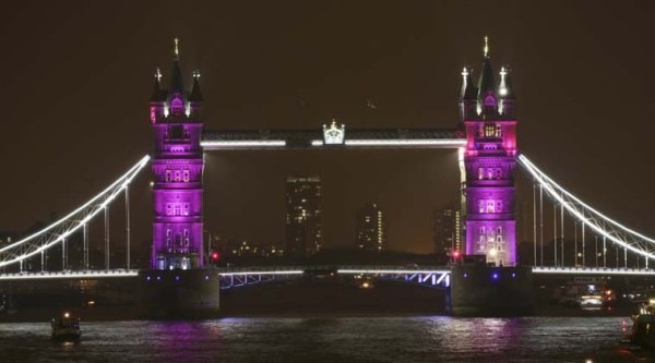 Famous British landmarks, including Tower Bridge, the London Eye and the fountains at Trafalgar Square, turned pink following the birth of the princess.(Source:AP)