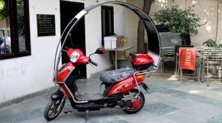 ETI Dynamics, solar electric hybrid scoooter, electric scooter, solar energy, tata nano, cars, technology news