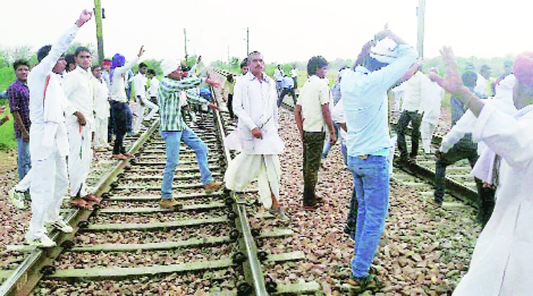 People of Gujjar community protest on the Delhi-Mumbai railway route in Rajasthan on Thursday.(Source: PTI)