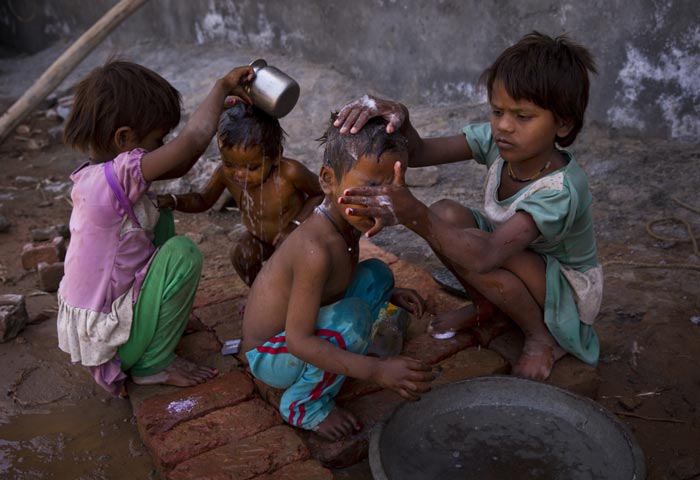 Heat wave, india heat wave, andra pradesh heat wave, tamil nadu heat wave, delhi heat wave, jammu heat wave, kolkata heat wave, india summers, Respite from summer, india news, india summer pictures, summer pictures, picture gallery, indian express picture gallery