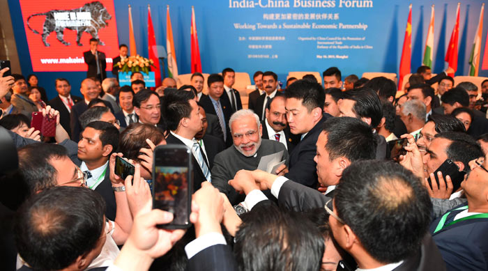 narendra modi, PM Modi, Modi in China, Modi in Shanghai, Modi China visit, Modi Indian community, Modi CEOs sanghai, Modi CEO meeting, Gandhian Centre in China, Gandhian studies centre in China, Modi Fudan University, Gandhian and Indian studies, Modi news, India news, China news, India China, India china relations, world news,