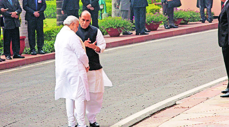 PM and Rajnath Singh in discussion in Parliament. (Source: Express photo by Neeraj Priyadarshi)