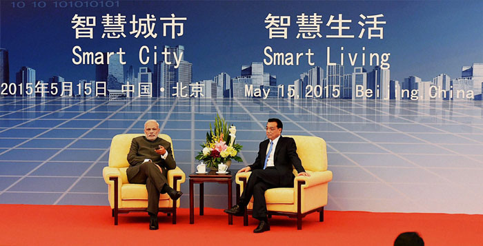Narendra Modi, Modi China visit, Modi visits China, Li Keqiang, Modi Li Keqiang, Modi meets Li Keqiang, India-China Forum, Modi Beijing, Modi China visit, World news