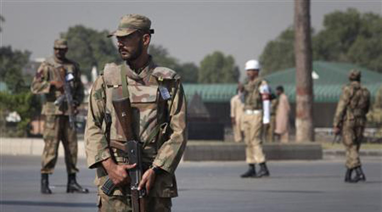 Armed soldiers standing guard outside Pakistan's army headquarters in Rawalpindi (Reuters photo)