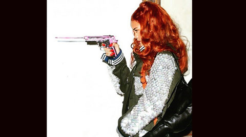 Rihanna Posts Daring Gun-toting Photo On Instagram | Music News - The ...