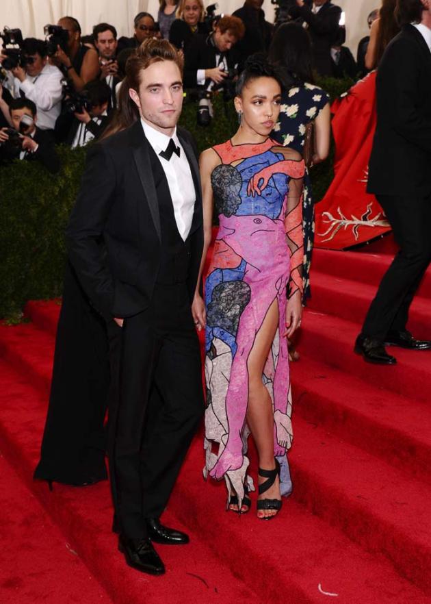 "I was mugged outside the yoga studio," said the singer, who is often spotted without security - even getting a night bus with Pattinson, 29, in Shoreditch on New Year's Eve.