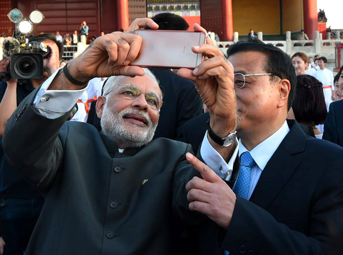 Narendra Modi, Narendra Modi in China, Modi in China, Modi selfie, Modi Keqiang selfie, Modi China selfie, Modi selfie diplomacy, Narendra Modi Keqiang, Modi in Beijing
