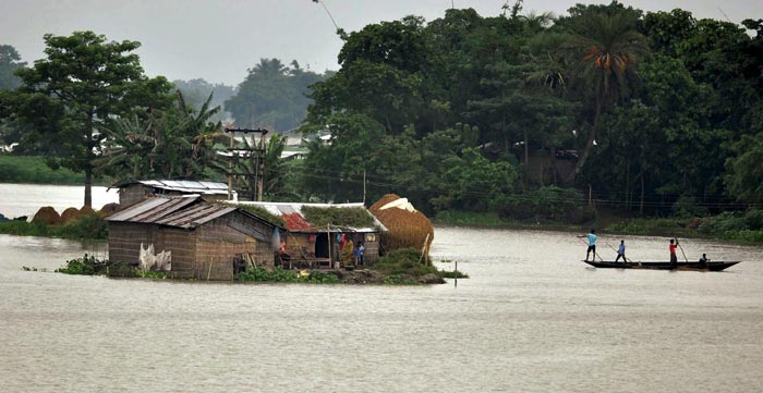 Assam flood, Assam floods, Assam monsoon, Assam monsoon flood, Brahmaputra overflowing, Assam Brahmaputra floods, Arunachal Pradesh floods, Brahmaputra tributaries floods, Assam flood affected districts, Assam MeT department, Assam Barpeta, Lakhimpur, Dhemaji floods, Assam flood news, Assam Flood photos, arunachal flood photos, Brahmaputra flood photos, india news, assam news, northeast news,